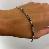 Bracciale tennis 5nere 1zircone
