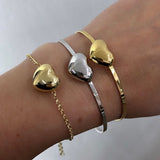 Bracciale rigido cuore bombato